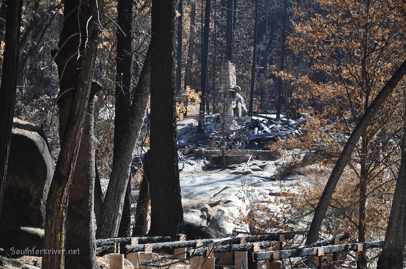 DSC_0803.JPG - Rec Hall fire place with burned tent cabin in foreground