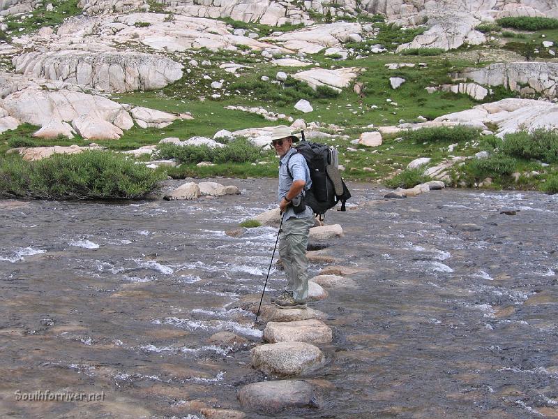 IMG_1753.JPG - Crossing the inlet of Evolution Lake